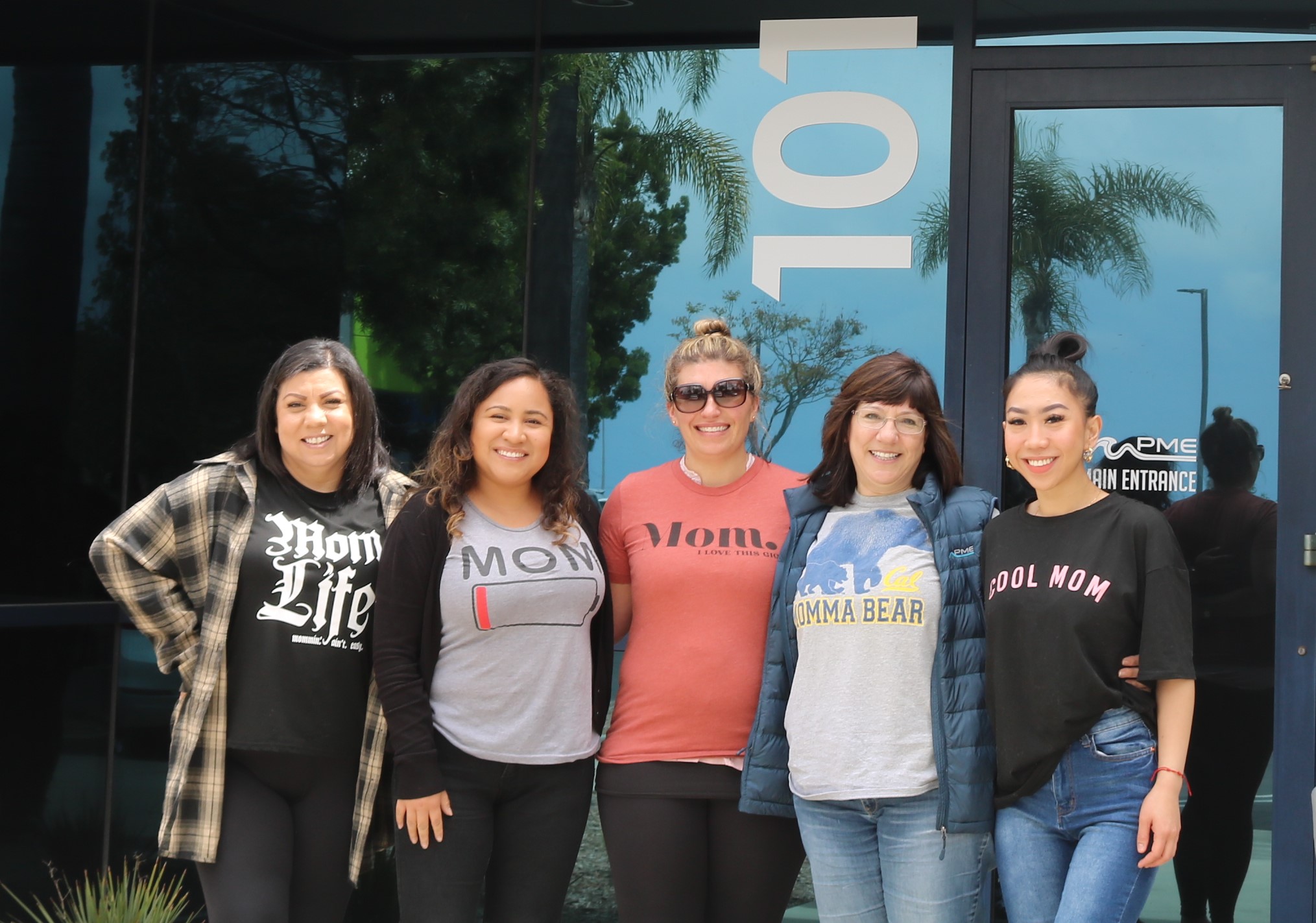 pme team in front of main entrance