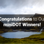 A natural environment containing a body of water with text stating “Congratulations to Our miniDOT Winners.”