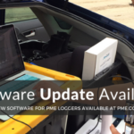 PME team member updating a PME product with the new software update. The computer is positioned on a large container with a yellow lid in the truck of a car. Text overlay reads, "Software Update Available, New Software for PME Loggers Available at pme.com."